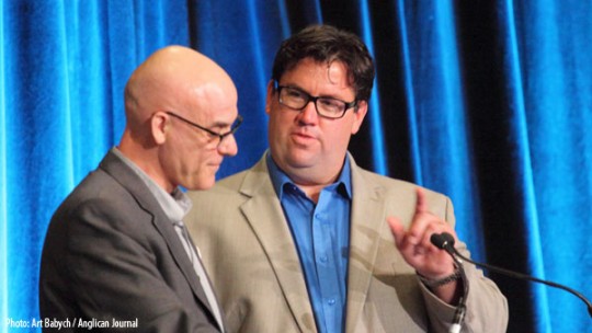 The Ven. PJ Hobbs (L) and the Rev. Joel Crouse (R) lead a community building exercise the first day of Joint Assembly. Photo by Art Babych/Anglican Journal